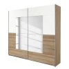 Rauch Blue Armoire à portes coulissantes Crato - Imitation chêne de Sonoma / Blanc alpin - Largeur : 218 cm